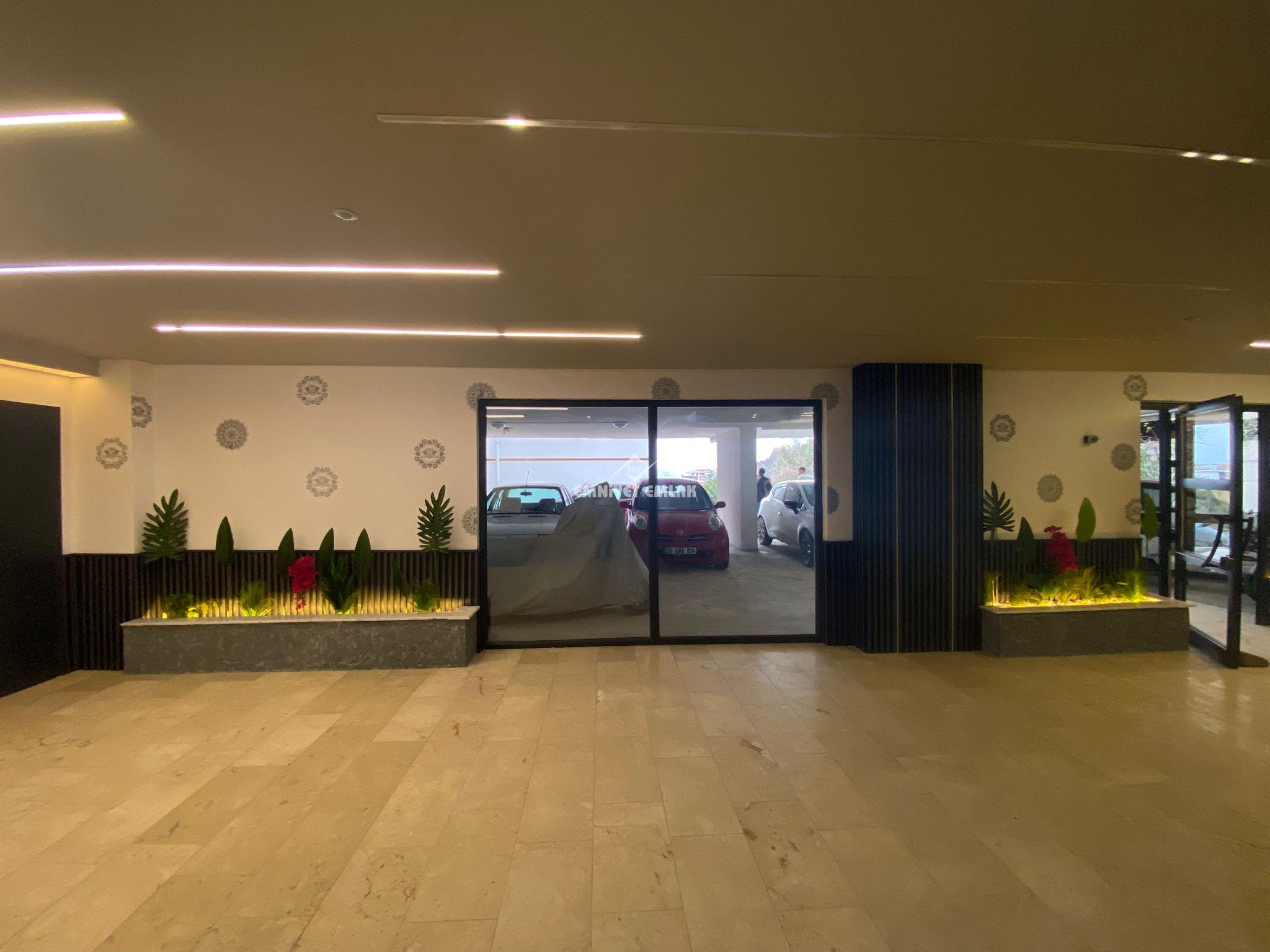 ADLİYE BÖLGESİNDE DENİZ VE DOĞA MANZARALI 1+1 EŞYALI KİRALIK DAİRE